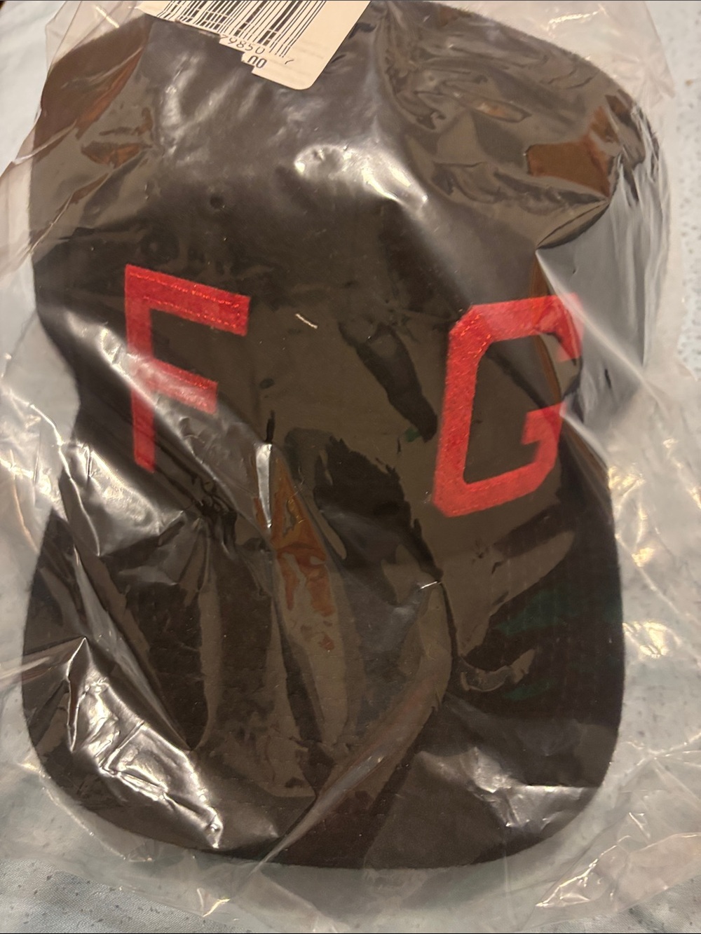 Fear of God Black Cap with Red FG Logo